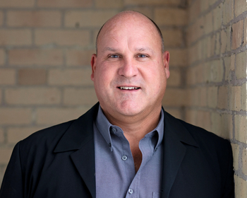 Portrait of Tim Estabrooks, Broker